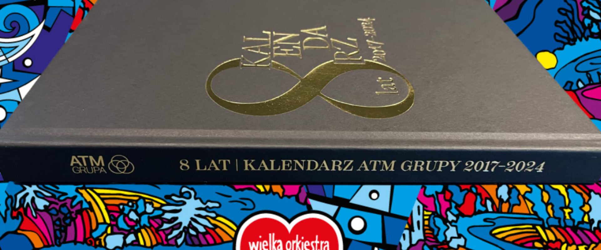 Gramy z WOŚP po raz kolejny! Licytuj pamiątkowe albumy ze zdjęciami z kalendarzy ATM Grupy
